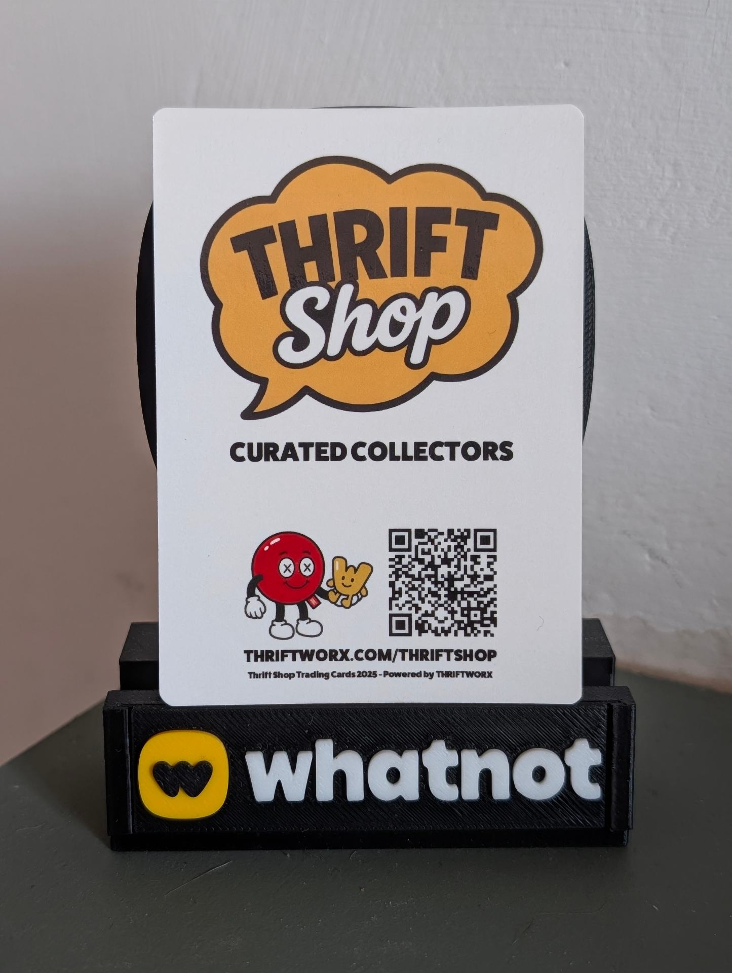 The original back: Thrift Shop logo, CURATED COLLECTORS, QR code to Thriftworx.