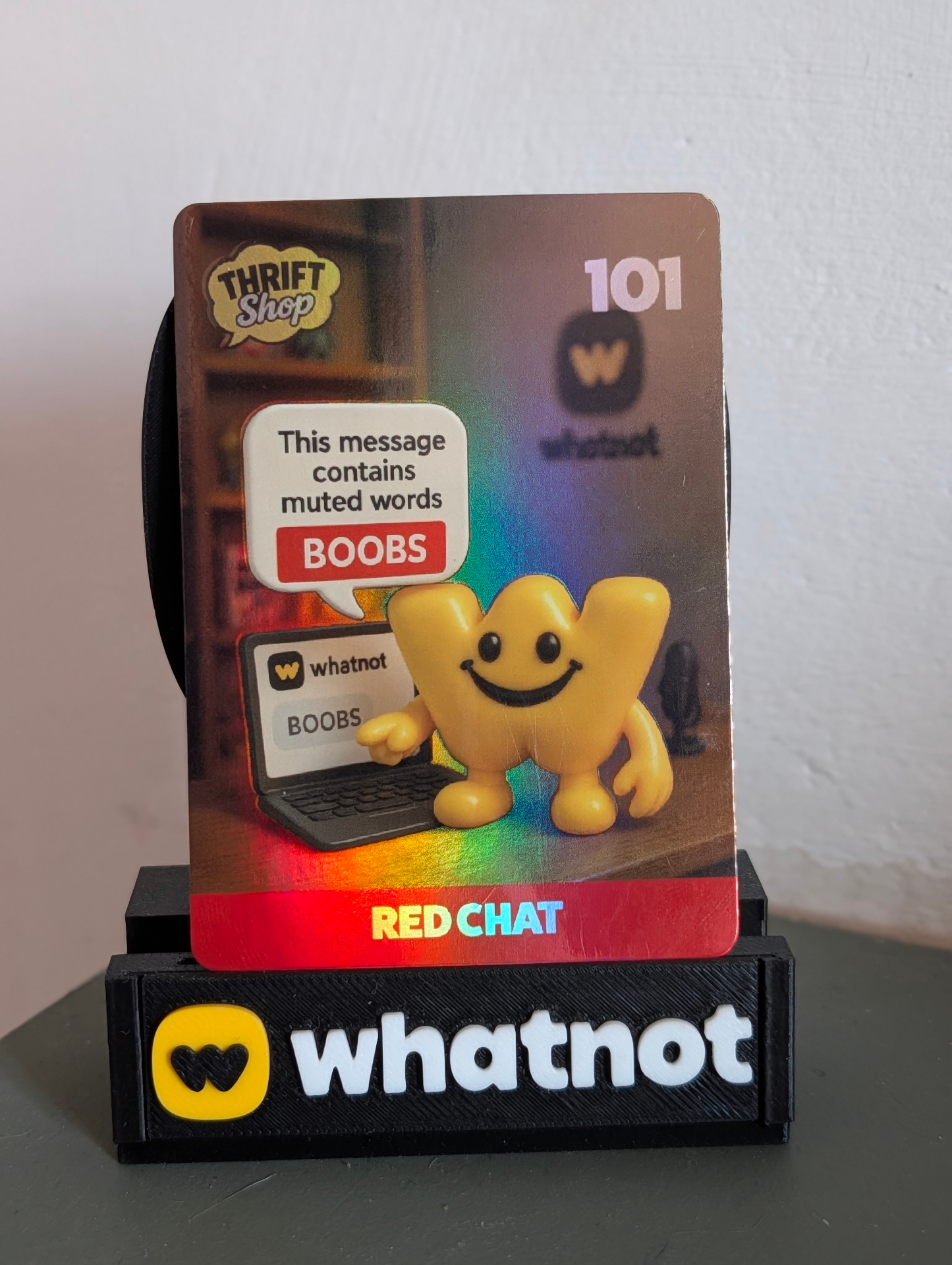 Card №101 — RED CHAT, full-bleed artwork with the coloured seller banner at the base.